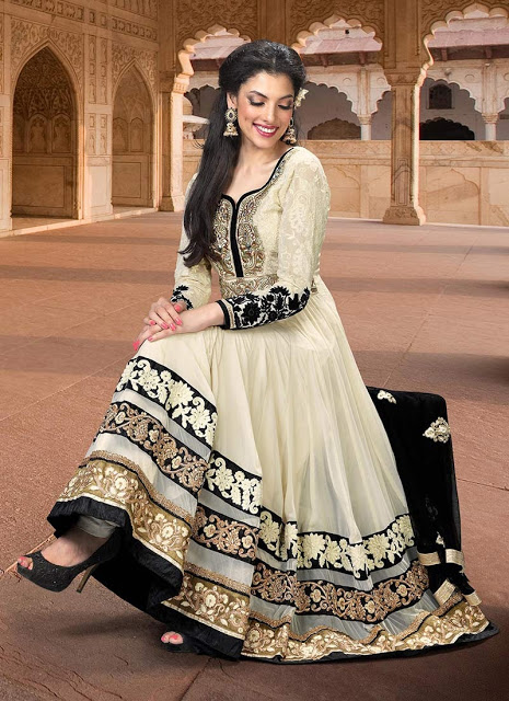 Beautiful Indian model poses in elegant dress Stock Photo | Adobe Stock